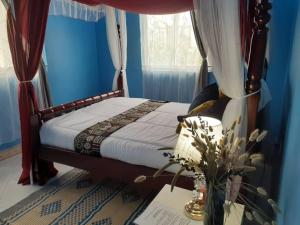 Postel nebo postele na pokoji v ubytování White Guest House -Kakiri