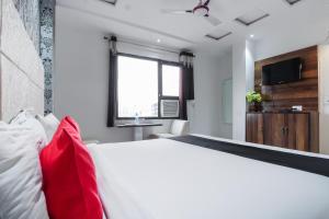 Fotografie z fotogalerie ubytování Hotel O Jalsa v destinaci Tājganj