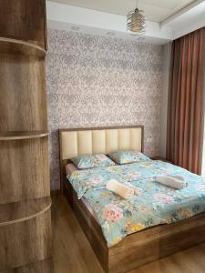 Postel nebo postele na pokoji v ubytování Marika apartment