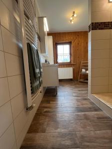 TV a/nebo společenská místnost v ubytování Hus un Köken
