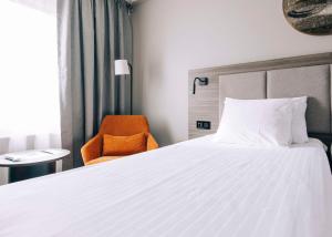 Ένα ή περισσότερα κρεβάτια σε δωμάτιο στο Best Western Plus Kalmarsund Hotell