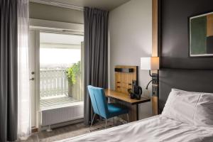 Letto o letti in una camera di Scandic Sarpsborg