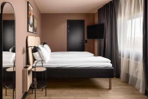 Letto o letti in una camera di Scandic Sarpsborg