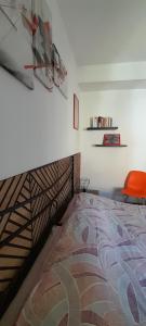 Posteľ alebo postele v izbe v ubytovaní La Casa dei Bersaglieri