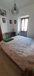 Posteľ alebo postele v izbe v ubytovaní La Casa dei Bersaglieri