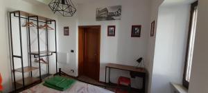 Posteľ alebo postele v izbe v ubytovaní La Casa dei Bersaglieri