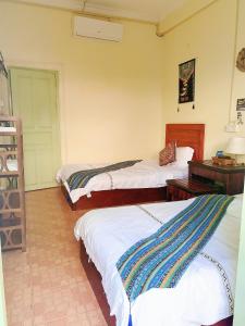 Ein Bett oder Betten in einem Zimmer der Unterkunft Phong lack Guest House