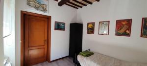 Posteľ alebo postele v izbe v ubytovaní La Casa dei Bersaglieri