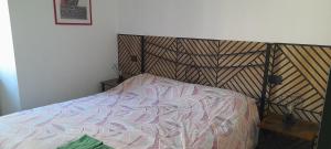 Posteľ alebo postele v izbe v ubytovaní La Casa dei Bersaglieri