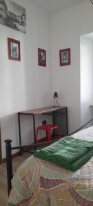 Posteľ alebo postele v izbe v ubytovaní La Casa dei Bersaglieri