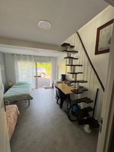 Ένα ή περισσότερα κρεβάτια σε δωμάτιο στο Chambre à la campagne