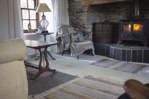 Posezení v ubytování Cosy Seaside Cottage Baltimore
