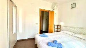 Posteľ alebo postele v izbe v ubytovaní Blue sea apartment
