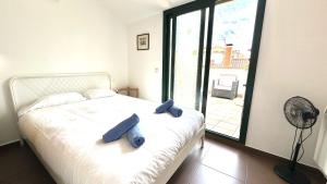 Posteľ alebo postele v izbe v ubytovaní Blue sea apartment