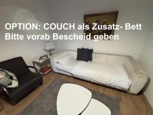 Ein Sitzbereich in der Unterkunft Ferienwohnung Lechfeld