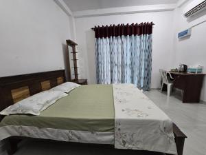 Postel nebo postele na pokoji v ubytování Cozy Nest