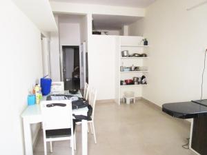 Η κουζίνα ή μικρή κουζίνα στο 2 BHK Couple friendly Appartment +19 φωτογραφίες