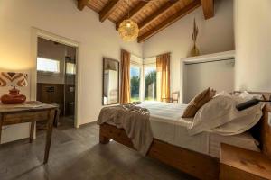 Postel nebo postele na pokoji v ubytování Casa Upupa + 77 fotografií