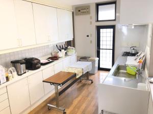 Dapur atau dapur kecil di 栃木迎賓館 +36 gambar