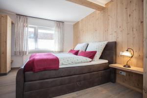 Postel nebo postele na pokoji v ubytování Haus Jungmann