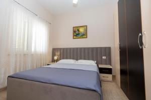 Letto o letti in una camera di Hotel Albania