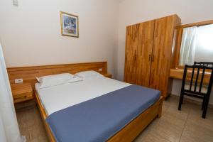 Letto o letti in una camera di Hotel Albania