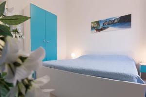 Posteľ alebo postele v izbe v ubytovaní Luna Rossa Salento - Casa Blu + 28 fotografií
