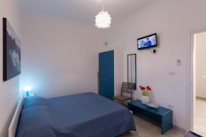 Posteľ alebo postele v izbe v ubytovaní Luna Rossa Salento - Casa Blu