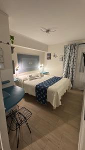 Postel nebo postele na pokoji v ubytování Lu Bàtil B&B - Rooms