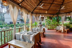 Restaurace v ubytování Whispering Palms Beach Resort
