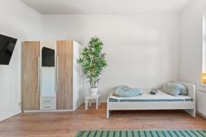 Postel nebo postele na pokoji v ubytování Spacious Apartment in Eberswalde