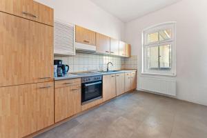 Kuchyň nebo kuchyňský kout v ubytování Spacious Apartment in Eberswalde + 7 fotografií
