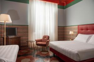 Postel nebo postele na pokoji v ubytování Hotel Oceania