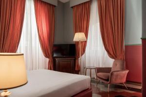 TV a/nebo společenská místnost v ubytování Hotel Oceania