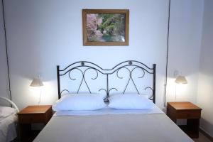 Postel nebo postele na pokoji v ubytování Villa Monte Sereno + 61 fotografií