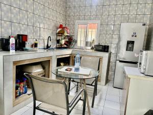 Kuchyň nebo kuchyňský kout v ubytování La Maison Blanche