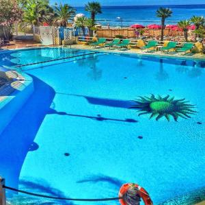 Bazén v ubytování holidaycasa Leone - Con posto auto a 200mt dal Mare nebo v jeho okolí