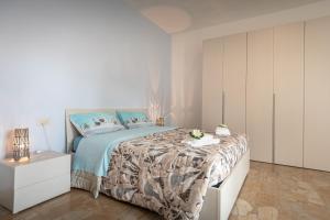 Letto o letti in una camera di Pace e Bene