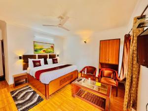 Letto o letti in una camera di The Ambience Resort, Nainital - A Hidden Gem Away From City Hustle