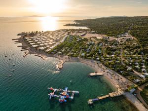 an aerial view of a harbor with boats in the water at Terra Park Phalaris in Novalja