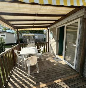 En balkon eller terrasse på Mobilhome 6 places 4 etoiles