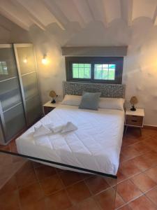 Postel nebo postele na pokoji v ubytování Villa Portitxol en Moraira