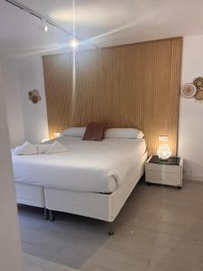 Postel nebo postele na pokoji v ubytování Villa Portitxol en Moraira