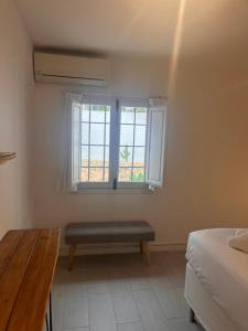 Postel nebo postele na pokoji v ubytování Villa Portitxol en Moraira