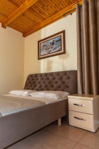 Letto o letti in una camera di Hotel Albania