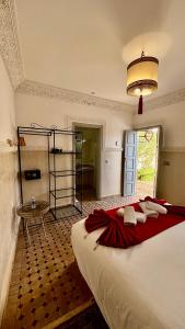 Postel nebo postele na pokoji v ubytování Riad magnolia privé
