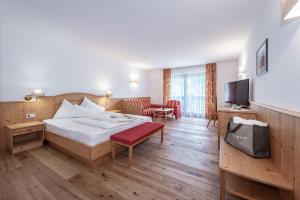 TV a/nebo společenská místnost v ubytování Hotel Torgglerhof