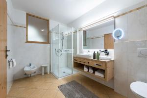 Koupelna v ubytování Hotel Torgglerhof