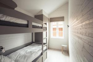 Postel nebo postele na pokoji v ubytování Sandhamn Seglarhotell