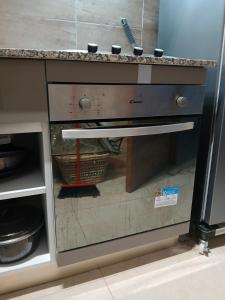 a kitchen counter with a sink in a kitchen at Tanger Beach coralia in Tangier